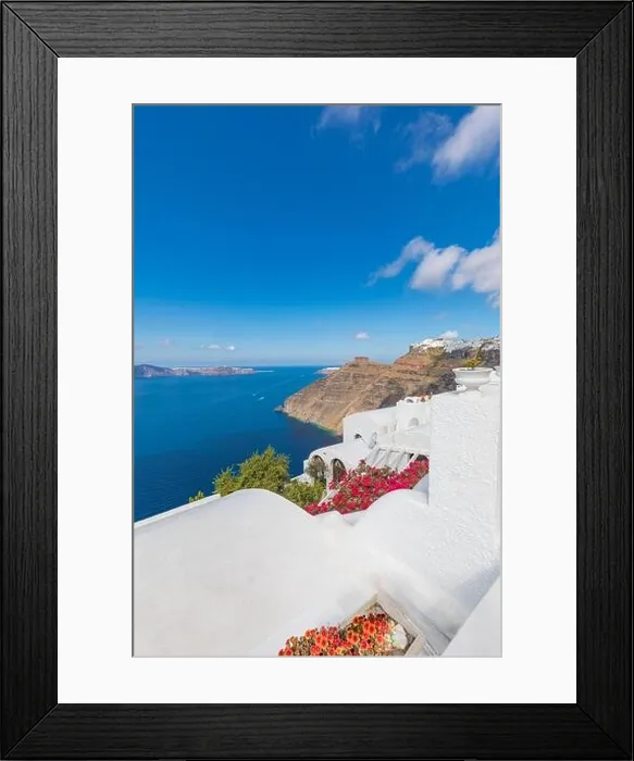Framed Print : Peaceful view in Santorini, Greece with white architecture flowers. Mediterranean summer mood, vacation and travel background. Luxury destination Framed Print : Peaceful view in Santorini, Greece with white architecture flowers. Mediterranean summer mood, vacation and travel background. Luxury destination