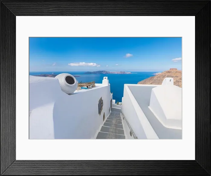 Framed Print : Peaceful view in Santorini, Greece with white architecture flowers. Mediterranean summer mood, vacation and travel background. Luxury destination Framed Print : Peaceful view in Santorini, Greece with white architecture flowers. Mediterranean summer mood, vacation and travel background. Luxury destination