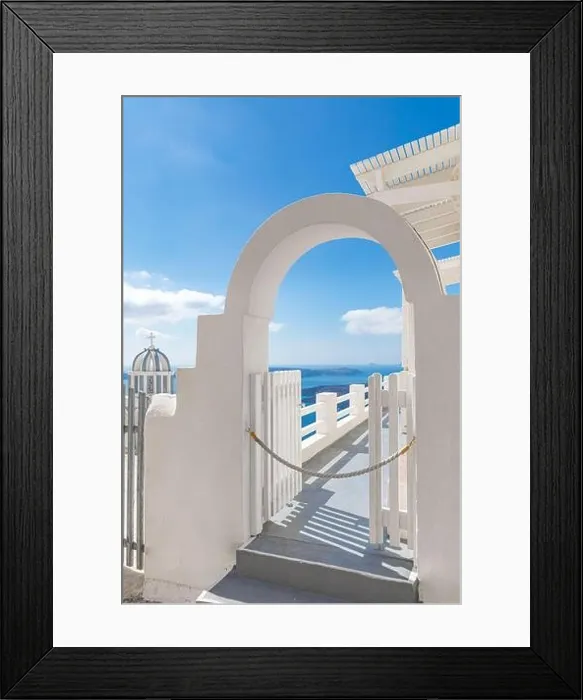 Framed Print : Fantastic vertical panoramic landscape, white architecture and white door entrance into blue sea view. Santorini, Greece, travel destination, vacation Framed Print : Fantastic vertical panoramic landscape, white architecture and white door entrance into blue sea view. Santorini, Greece, travel destination, vacation