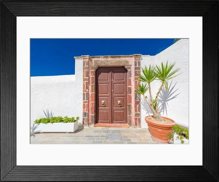 Framed Print : Old wooden door with white architecture in Santorini Greece. Sunny summer weather, vacation, Europe traveling destination, relax, background Framed Print : Old wooden door with white architecture in Santorini Greece. Sunny summer weather, vacation, Europe traveling destination, relax, background