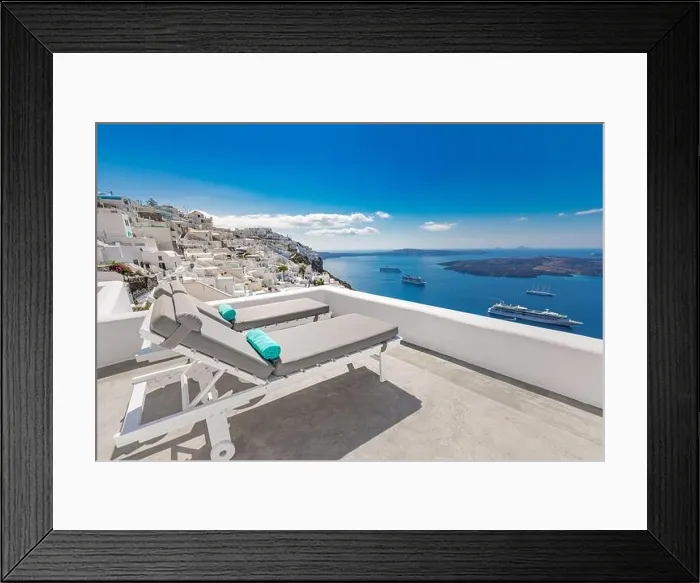 Framed Print : Chaise lounge in Santorini, Greece. Luxury summer travel landscape, vacation sea view. White architecture, relax over blue bay, cruise ships, resort Framed Print : Chaise lounge in Santorini, Greece. Luxury summer travel landscape, vacation sea view. White architecture, relax over blue bay, cruise ships, resort
