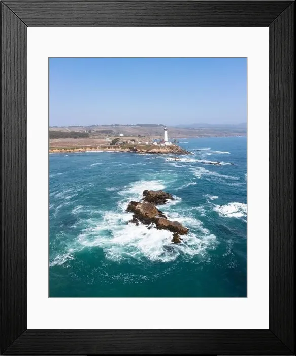 Framed Print : Cold Pacific Ocean waves crash against the rugged and scenic northern California coastline where a lighthouse stands just north of Santa Cruz Framed Print : Cold Pacific Ocean waves crash against the rugged and scenic northern California coastline where a lighthouse stands just north of Santa Cruz
