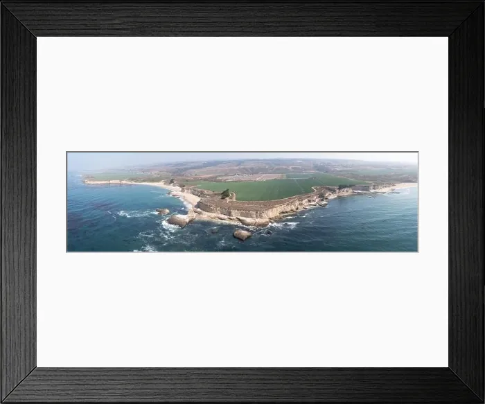 Framed Print : Pacific Ocean waves crash against the rugged and scenic coastline of California near Santa Cruz. The Pacific Coast Highway runs along this region Framed Print : Pacific Ocean waves crash against the rugged and scenic coastline of California near Santa Cruz. The Pacific Coast Highway runs along this region