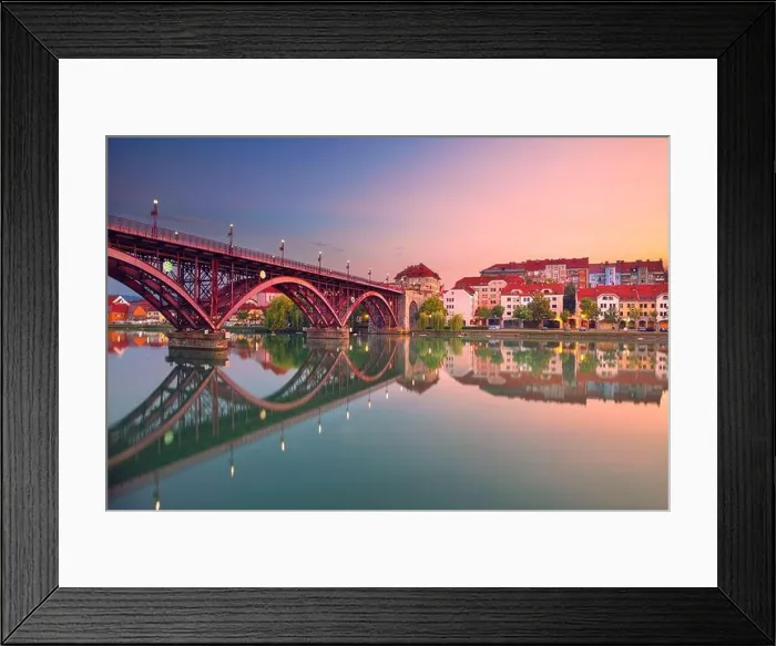 Framed Print : Maribor, Slovenia. Cityscape image of Maribor, Slovenia at beautiful summer sunrise with reflection of the city in Drava River Framed Print : Maribor, Slovenia. Cityscape image of Maribor, Slovenia at beautiful summer sunrise with reflection of the city in Drava River