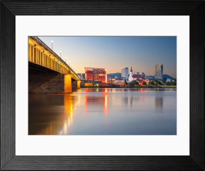 Framed Print : Linz, Austria. Cityscape image of riverside Linz, Austria at summer sunset with reflection of the city lights in Danube river Framed Print : Linz, Austria. Cityscape image of riverside Linz, Austria at summer sunset with reflection of the city lights in Danube river