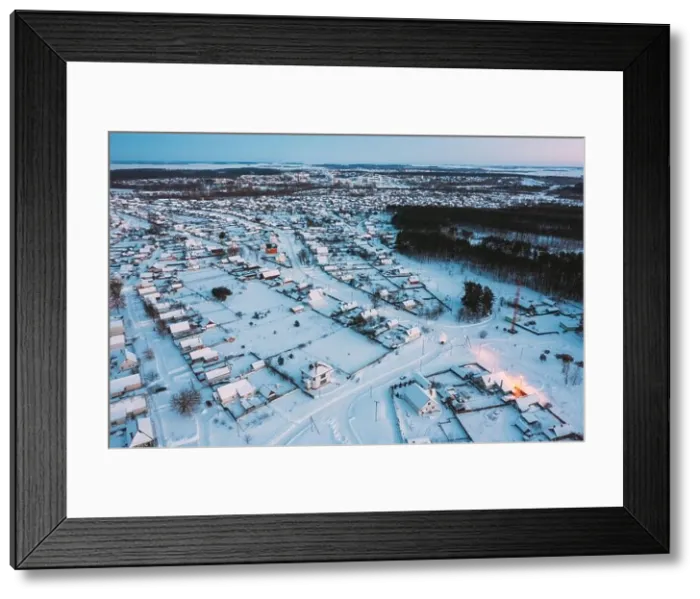Framed Print : Aerial View Of Town Skyline Winter Evening Night. Snowy Landscape Cityscape Skyline Framed Print : Aerial View Of Town Skyline Winter Evening Night. Snowy Landscape Cityscape Skyline