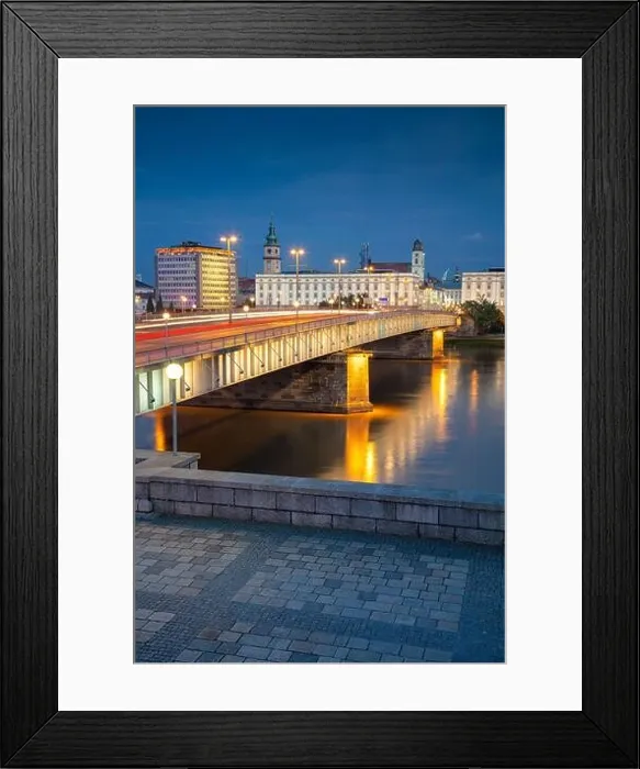 Framed Print : Linz, Austria. Cityscape image of riverside Linz, Austria during twilight blue hour with reflection of the city lights in Danube river Framed Print : Linz, Austria. Cityscape image of riverside Linz, Austria during twilight blue hour with reflection of the city lights in Danube river