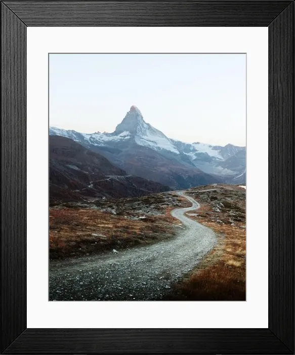 Framed Print : Picturesque view of Matterhorn Cervino peak, dirt road and Stellisee lake in Swiss Alps. Zermatt resort location, Switzerland. Landscape photography Framed Print : Picturesque view of Matterhorn Cervino peak, dirt road and Stellisee lake in Swiss Alps. Zermatt resort location, Switzerland. Landscape photography