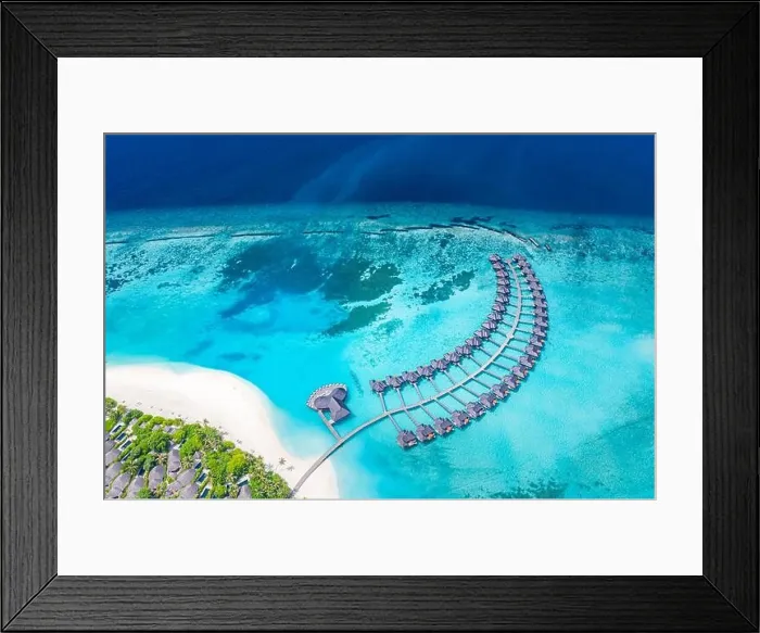 Framed Print : Amazing aerial landscape, Maldives island, luxury water villas resort and wooden pier. Beautiful sky and clouds and beach, summer vacation holiday Framed Print : Amazing aerial landscape, Maldives island, luxury water villas resort and wooden pier. Beautiful sky and clouds and beach, summer vacation holiday