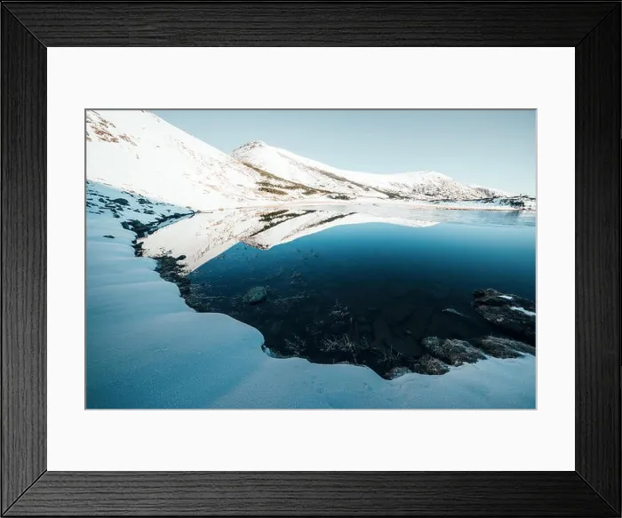 Framed Print : Frozen mountain lake with blue ice Framed Print : Frozen mountain lake with blue ice