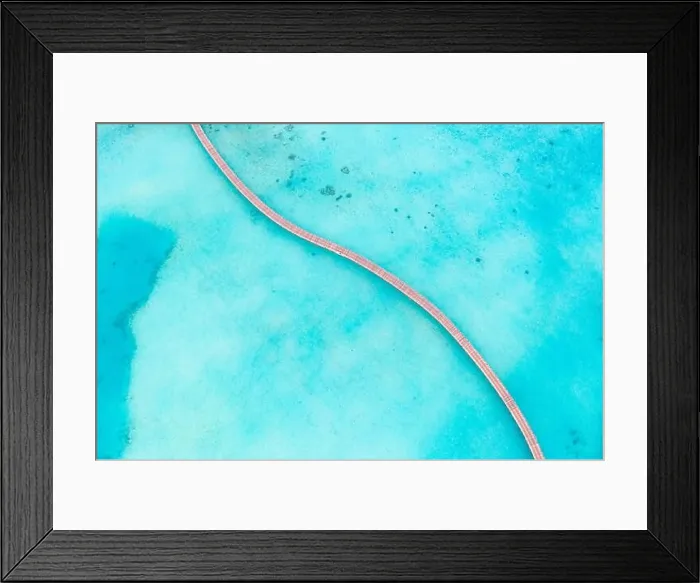 Framed Print : Exotic aerial view of turquoise water with wooden jetty in Maldives islands. Amazing sea lagoon. Tropical ocean water, sunny weather, abstract aerial Framed Print : Exotic aerial view of turquoise water with wooden jetty in Maldives islands. Amazing sea lagoon. Tropical ocean water, sunny weather, abstract aerial
