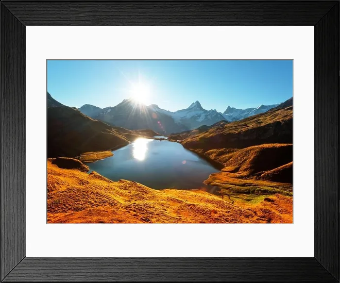 Framed Print : Picturesque view on Bachalpsee lake in Swiss Alps mountains. Snowy peaks of Wetterhorn, Mittelhorn and Rosenhorn on background Framed Print : Picturesque view on Bachalpsee lake in Swiss Alps mountains. Snowy peaks of Wetterhorn, Mittelhorn and Rosenhorn on background