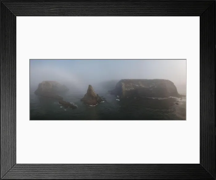 Framed Print : The Pacific Ocean washes against the rugged and scenic coastline of California in Mendocino, California. This part of the west coast is often foggy Framed Print : The Pacific Ocean washes against the rugged and scenic coastline of California in Mendocino, California. This part of the west coast is often foggy