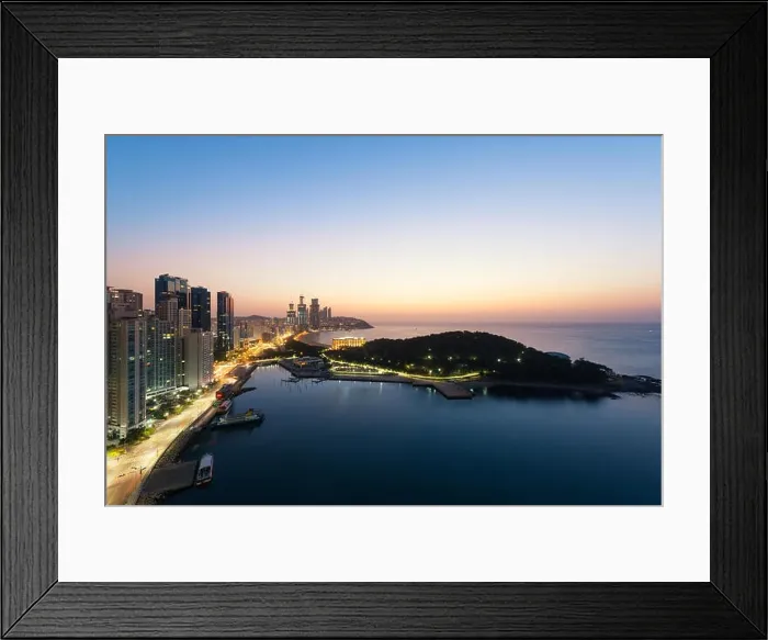 Framed Print : Sunrise at Haeundae beach in Busan. Haeundae beach is Busan's most popular beach in South Korea Framed Print : Sunrise at Haeundae beach in Busan. Haeundae beach is Busan's most popular beach in South Korea