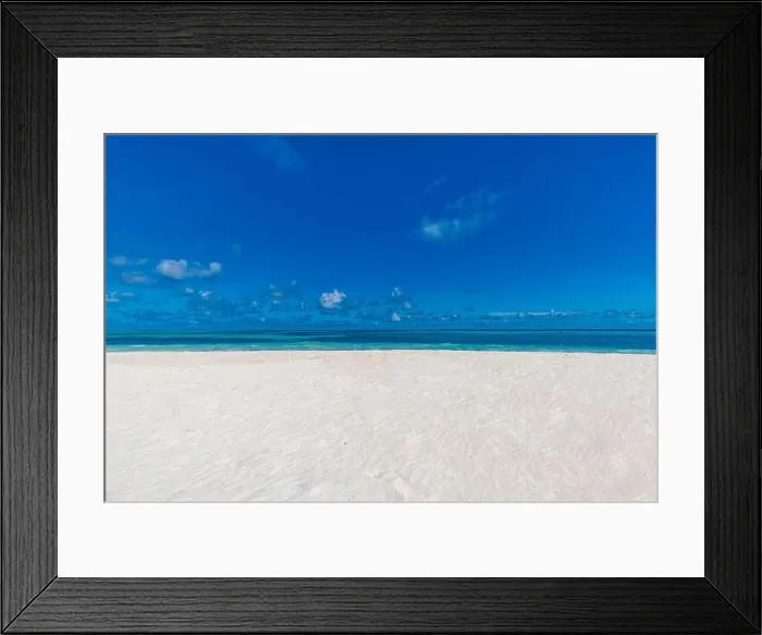 Framed Print : Closeup of sand on beach and blue summer sky. Panoramic beach landscape. Empty tropical beach and seascape. Blue sky, soft sand, seascape over horizon Framed Print : Closeup of sand on beach and blue summer sky. Panoramic beach landscape. Empty tropical beach and seascape. Blue sky, soft sand, seascape over horizon
