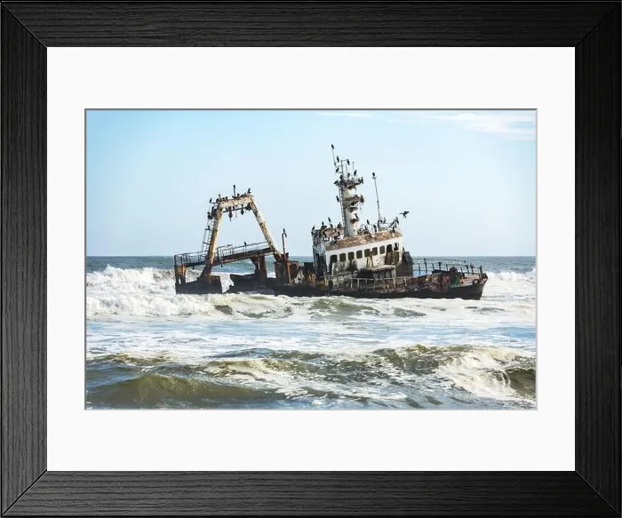 Framed Print : The shipwreck in the Atlantic ocean on Skeleton Coast near Swakopmund in Namibia, Africa. Landscape photography Framed Print : The shipwreck in the Atlantic ocean on Skeleton Coast near Swakopmund in Namibia, Africa. Landscape photography