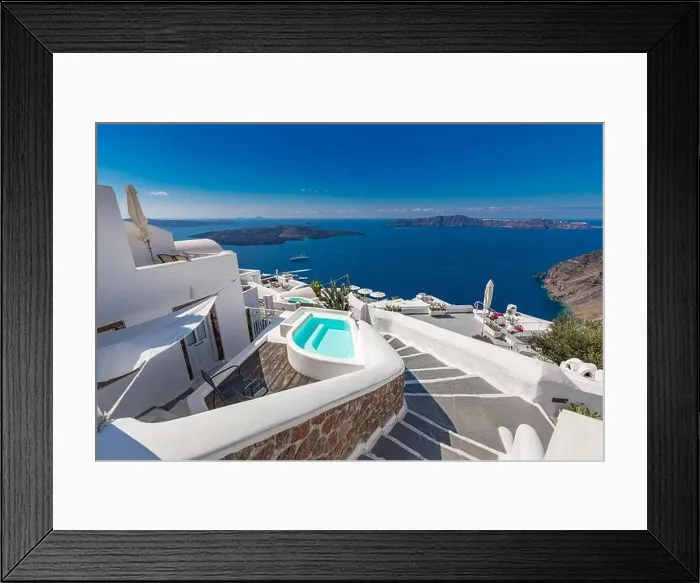 Framed Print : View of caldera and swimming pool, typical white architecture, romantic village on Santorini island, Greece. Summer vacation, cruise ships, sea view Framed Print : View of caldera and swimming pool, typical white architecture, romantic village on Santorini island, Greece. Summer vacation, cruise ships, sea view
