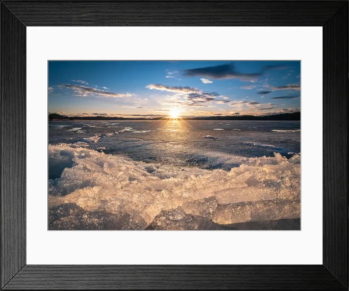 Framed Print : Scenic landscape with sunset and melting ice at beautiful evening in Finland Framed Print : Scenic landscape with sunset and melting ice at beautiful evening in Finland