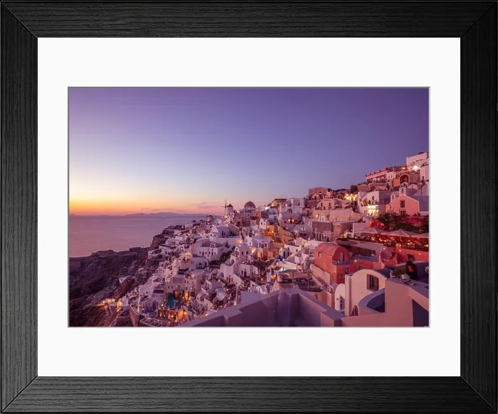 Framed Print : Oia town cityscape at Santorini island in Greece. Stunning sunset landscape seascape, tranquil, relaxing summer romance, couple vacation destination Framed Print : Oia town cityscape at Santorini island in Greece. Stunning sunset landscape seascape, tranquil, relaxing summer romance, couple vacation destination