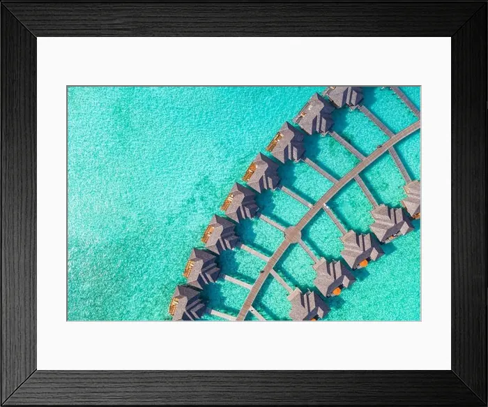 Framed Print : Aerial landscape with tropical resort villas, bungalow, palm trees and amazing sea shore. Travel destination, luxury vacation, summer nature scene Framed Print : Aerial landscape with tropical resort villas, bungalow, palm trees and amazing sea shore. Travel destination, luxury vacation, summer nature scene