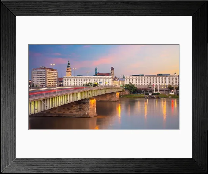Framed Print : Linz, Austria. Panoramic cityscape image of riverside Linz, Austria during twilight blue hour with reflection of the city lights in Danube river Framed Print : Linz, Austria. Panoramic cityscape image of riverside Linz, Austria during twilight blue hour with reflection of the city lights in Danube river