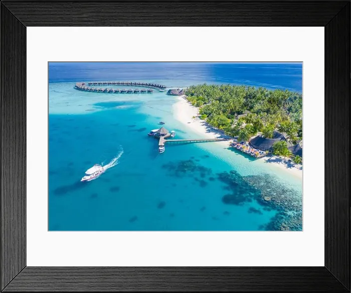 Framed Print : Aerial landscape with tropical resort villas, bungalow, palm trees and amazing sea shore. Travel destination, luxury vacation, summer nature scene Framed Print : Aerial landscape with tropical resort villas, bungalow, palm trees and amazing sea shore. Travel destination, luxury vacation, summer nature scene