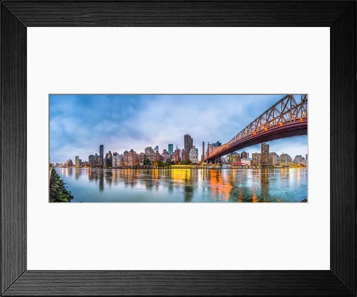 Framed Print : New York, New York, USA skyline of Manhattan from across the East River with Queensboro Bridge at dusk Framed Print : New York, New York, USA skyline of Manhattan from across the East River with Queensboro Bridge at dusk
