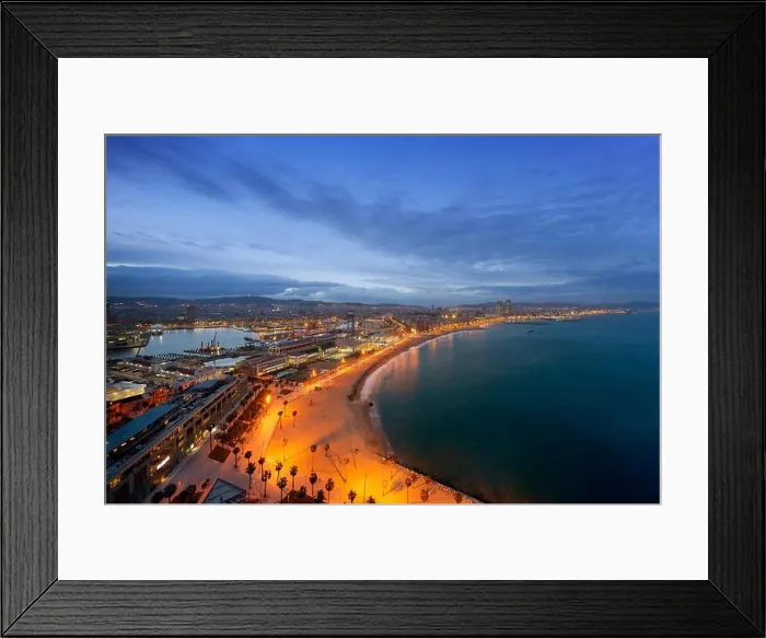 Framed Print : Aerial view of Barcelona Beach in summer night along seaside in Barcelona, Spain. Mediterranean Sea in Spain Framed Print : Aerial view of Barcelona Beach in summer night along seaside in Barcelona, Spain. Mediterranean Sea in Spain