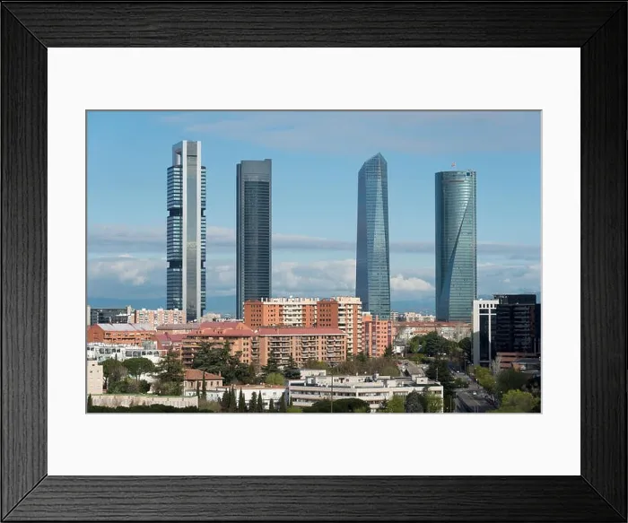 Framed Print : Madrid cityscape at daytime. Landscape of Madrid business building at Four Tower. Modern high building in business district area at Spain Framed Print : Madrid cityscape at daytime. Landscape of Madrid business building at Four Tower. Modern high building in business district area at Spain