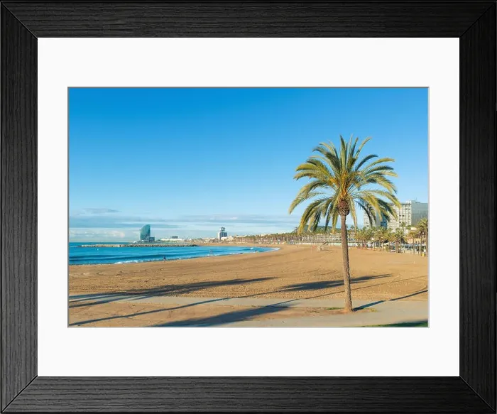 Framed Print : Barceloneta Beach in Barcelona with colorful sky at sunrise. Seafront, beach, coast in Spain. Suburb of Barcelona, Catalonia Framed Print : Barceloneta Beach in Barcelona with colorful sky at sunrise. Seafront, beach, coast in Spain. Suburb of Barcelona, Catalonia