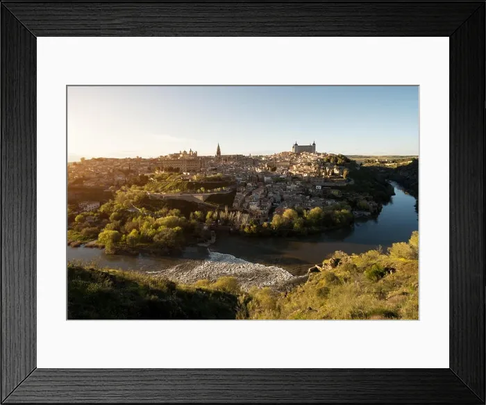 Framed Print : Panoramic view of the medieval center of the city of Toledo, Spain. It features the Tejo river, the Cathedral and Alcazar of Toledo, Spain Framed Print : Panoramic view of the medieval center of the city of Toledo, Spain. It features the Tejo river, the Cathedral and Alcazar of Toledo, Spain