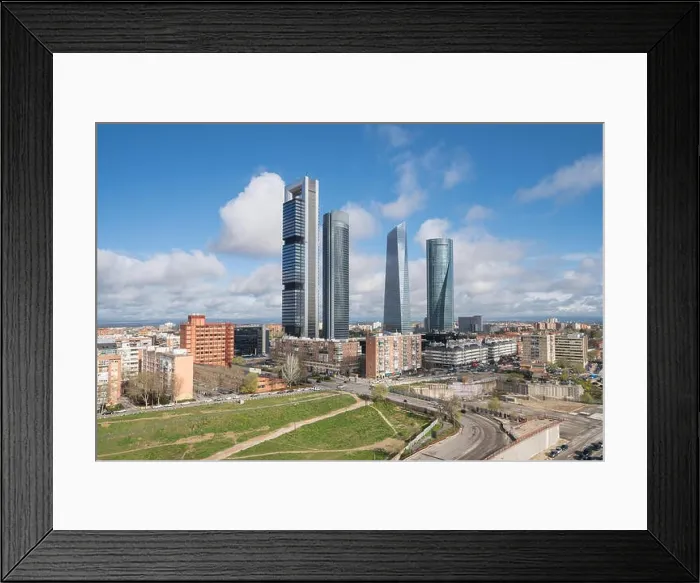 Framed Print : Madrid cityscape at daytime. Landscape of Madrid business building at Four Tower. Modern high building in business district area at Spain Framed Print : Madrid cityscape at daytime. Landscape of Madrid business building at Four Tower. Modern high building in business district area at Spain