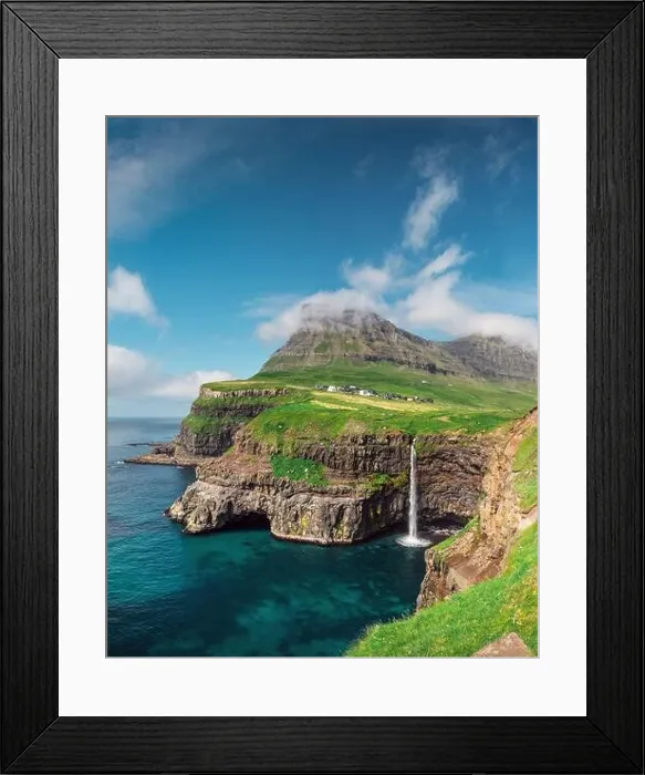 Framed Print : Incredible day view of Mulafossur waterfall in Gasadalur village, Vagar Island of the Faroe Islands, Denmark. Landscape photography Framed Print : Incredible day view of Mulafossur waterfall in Gasadalur village, Vagar Island of the Faroe Islands, Denmark. Landscape photography