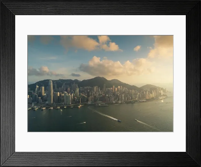 Framed Print : Aerial view of Hong Kong skyline and Victoria Harbor during sunset in Hong Kong. Asia Framed Print : Aerial view of Hong Kong skyline and Victoria Harbor during sunset in Hong Kong. Asia