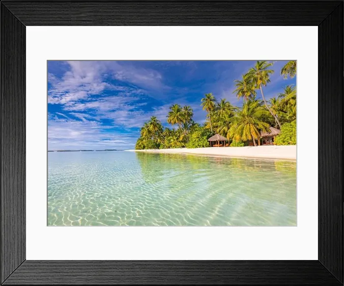 Framed Print : Stunning tourism landscape. Luxurious beach resort, palm trees over calm sea water, beach villas and blue sky. Romantic destination, vacation, holiday Framed Print : Stunning tourism landscape. Luxurious beach resort, palm trees over calm sea water, beach villas and blue sky. Romantic destination, vacation, holiday