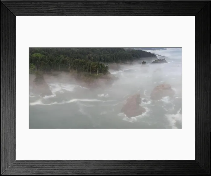 Framed Print : Forest meets the Pacific Ocean along the scenic coastline of southern Oregon. This part of the Pacific Northwest is known for its often foggy climate Framed Print : Forest meets the Pacific Ocean along the scenic coastline of southern Oregon. This part of the Pacific Northwest is known for its often foggy climate