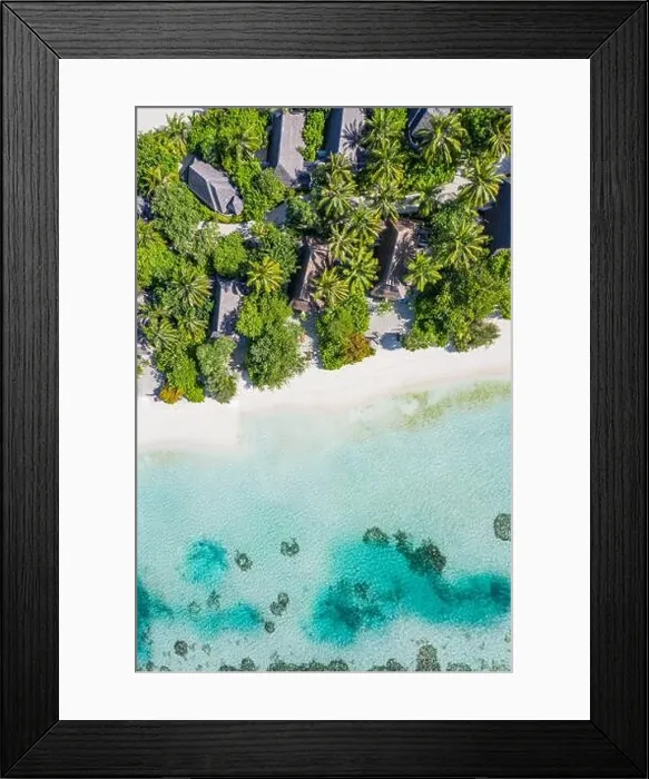 Framed Print : Aerial view of Caribbean resort. Top view of amazing tropical landscape, shallow sea lagoon, relax sandy beach and palm trees around villas, bungalows