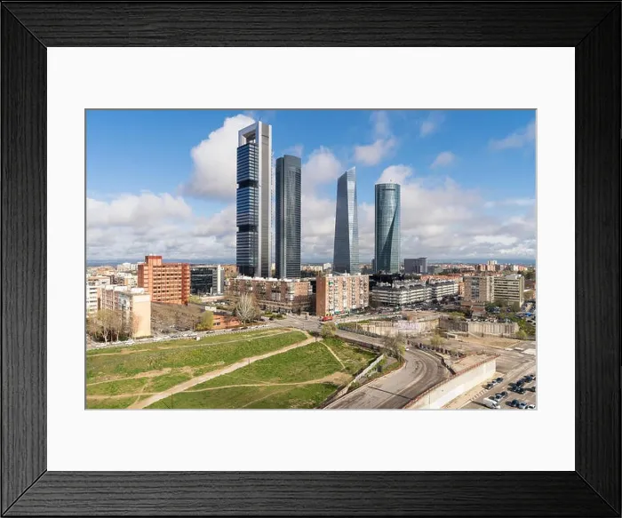 Framed Print : Madrid cityscape at daytime. Landscape of Madrid business building at Four Tower. Modern high building in business district area at Spain Framed Print : Madrid cityscape at daytime. Landscape of Madrid business building at Four Tower. Modern high building in business district area at Spain