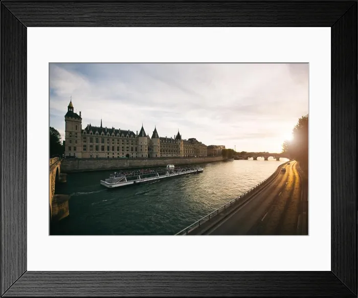 Framed Print : Tourist boat tour on Seine river with beautiful sunset in Paris. Cruise ship sightseeing along river in Paris, France Framed Print : Tourist boat tour on Seine river with beautiful sunset in Paris. Cruise ship sightseeing along river in Paris, France