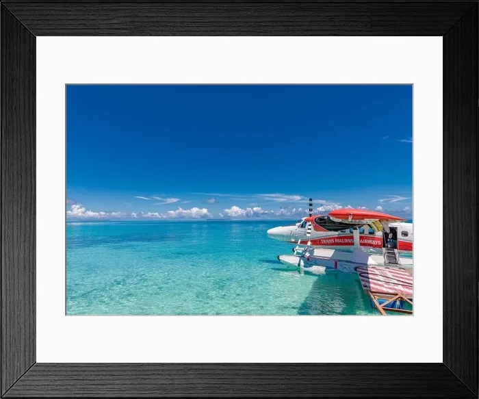 Framed Print : South Ari Atoll, Maldives - December 15 2019: Maldives airline seaplane near tropical islands in blue sea. Amazing summer travel vacation Framed Print : South Ari Atoll, Maldives - December 15 2019: Maldives airline seaplane near tropical islands in blue sea. Amazing summer travel vacation