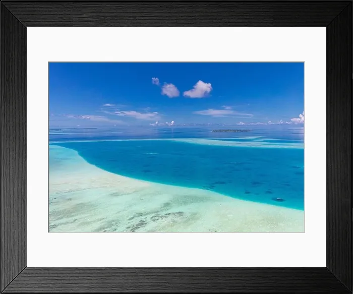Framed Print : Aerial view on tropical islands. Maldives island, coral reef, picturesque nature landscape, seascape. Amazingly beautiful aerial drone view Framed Print : Aerial view on tropical islands. Maldives island, coral reef, picturesque nature landscape, seascape. Amazingly beautiful aerial drone view