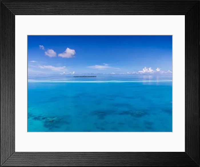 Framed Print : Aerial view on tropical islands. Maldives island, coral reef, picturesque nature landscape, seascape. Amazingly beautiful aerial drone view Framed Print : Aerial view on tropical islands. Maldives island, coral reef, picturesque nature landscape, seascape. Amazingly beautiful aerial drone view