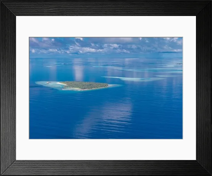 Framed Print : Aerial view on tropical islands. Maldives island, coral reef, picturesque nature landscape, seascape. Amazingly beautiful aerial drone view Framed Print : Aerial view on tropical islands. Maldives island, coral reef, picturesque nature landscape, seascape. Amazingly beautiful aerial drone view