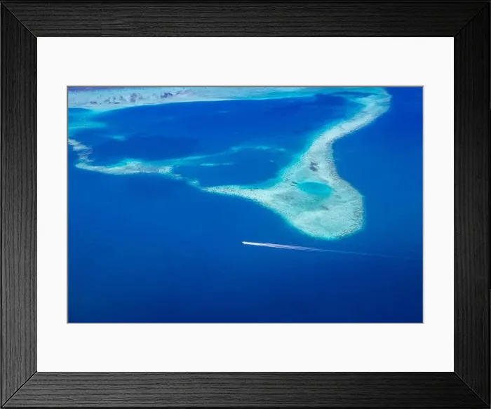 Framed Print : Aerial view on tropical islands. Maldives island, coral reef, picturesque nature landscape, seascape. Amazingly beautiful aerial drone view Framed Print : Aerial view on tropical islands. Maldives island, coral reef, picturesque nature landscape, seascape. Amazingly beautiful aerial drone view