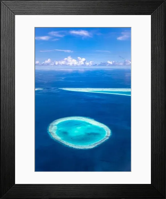 Framed Print : Aerial view on tropical islands. Maldives island, coral reef, picturesque nature landscape, seascape. Amazingly beautiful aerial drone view Framed Print : Aerial view on tropical islands. Maldives island, coral reef, picturesque nature landscape, seascape. Amazingly beautiful aerial drone view