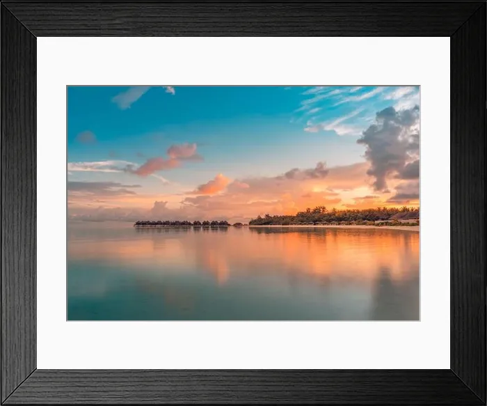 Framed Print : Luxury beach resort. Water villas on island shore, tropical bay lagoon. Sea reflection, peaceful sunset sunrise landscape. Paradise nature Framed Print : Luxury beach resort. Water villas on island shore, tropical bay lagoon. Sea reflection, peaceful sunset sunrise landscape. Paradise nature