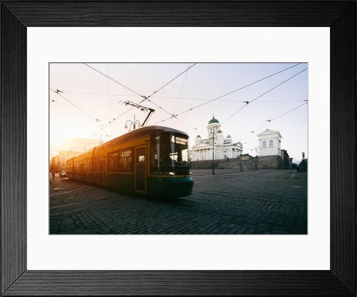 Framed Print : Tram passing Helsinki Senate Square during sunset with Helsinki Cathedral in the background at Finland