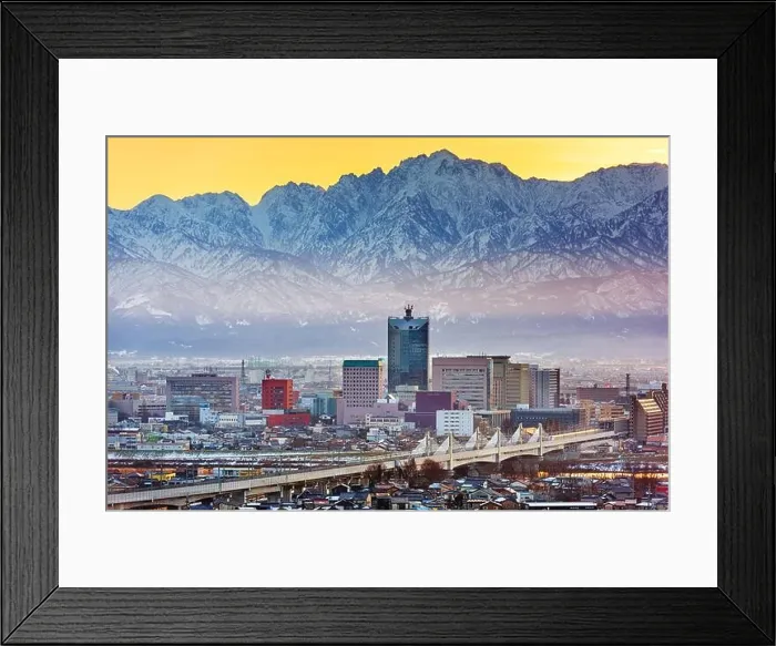 Framed Print : Toyama, Japan downtown city skyline with Tateyama Mountain at dawn Framed Print : Toyama, Japan downtown city skyline with Tateyama Mountain at dawn