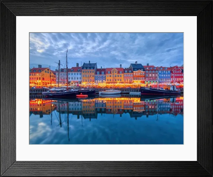 Framed Print : Copenhagen, Denmark - July 02, 2021: Copenhagen iconic view. Famous old Nyhavn port in the center of Copenhagen, Denmark during summer night Framed Print : Copenhagen, Denmark - July 02, 2021: Copenhagen iconic view. Famous old Nyhavn port in the center of Copenhagen, Denmark during summer night