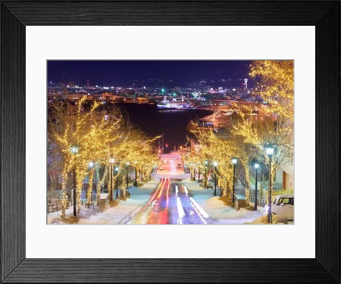 Framed Print : Hakodate, Hokkaido, Japan on Hachiman-zaka slope with holiday lighting at night Framed Print : Hakodate, Hokkaido, Japan on Hachiman-zaka slope with holiday lighting at night